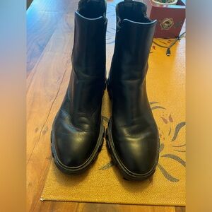 Michael Kors women’s lug tread black leather boots, size 7.5
